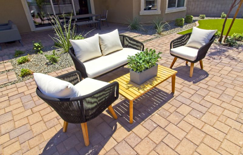 Modern paver patio with seating